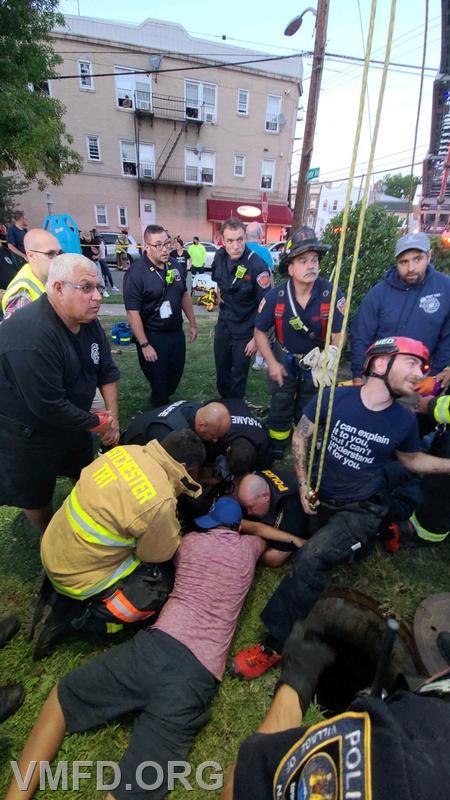 Responders from multiple agencies including the VMFD, VMPD, MEMS , NRFD, Westchester County Technical Rescue Team, and several other agencies, work together to free a victim trapped in a drainage hole. 